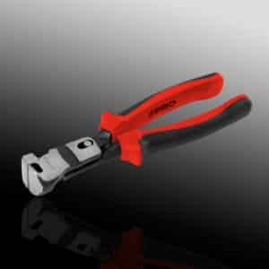 Red and black handled wire cutter pliers on dark background.