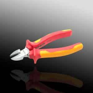 Insulated combination pliers on reflective surface.