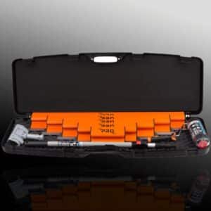 Professional torque wrench set in case on dark background.